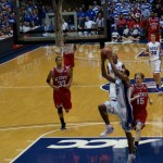 Henderson drives in for a dunk after an assist from McClure, helping Duke to a 73-58 win over N.C. State on Tuesday evening.