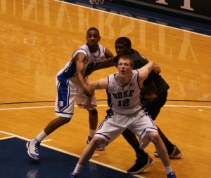 Singler and Williams battle for a rebound - BDN Photo