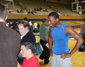 Nolan goofs on Jon Scheyer while he is being interviewed