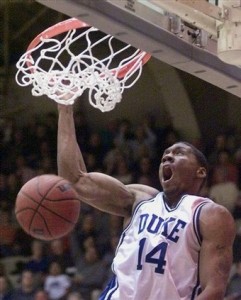 A.P. Duke Assistant Coach Nate James flushes a dunk during his playing days at Duke