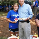 Coach David Cutcliffe poses with his daughter during a pre season event - BDN Photo