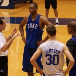 Lance Thomas listens to Coach K during a Duke practice - BDN Photo
