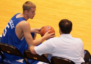 Mason Plumlee listening to Coach K during a Duke practice - BDN Photo