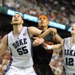 Zoubs and Scheyer battle for a board vs Miami, Lance King Images
