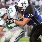Matt Skura in blue gives Duke a verbal after the this weekends camp